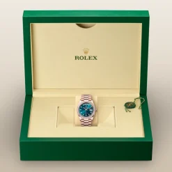 rolex  Day-Date 36 Oyster, 36 mm, Everose gold and diamonds M128395TBR-0032